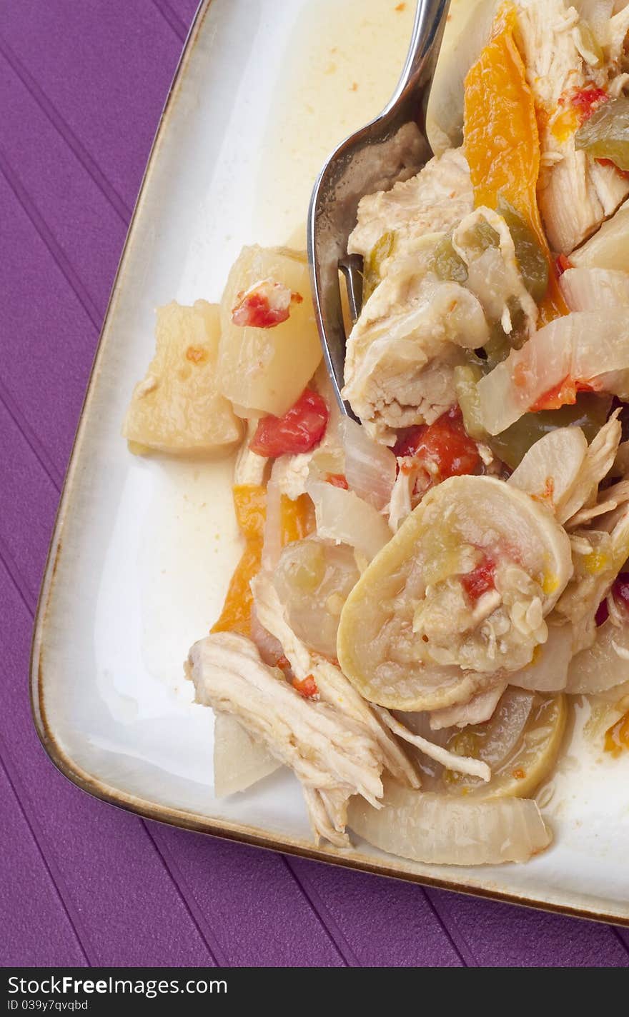 Tropical Chicken Dinner on Plate with Fork.