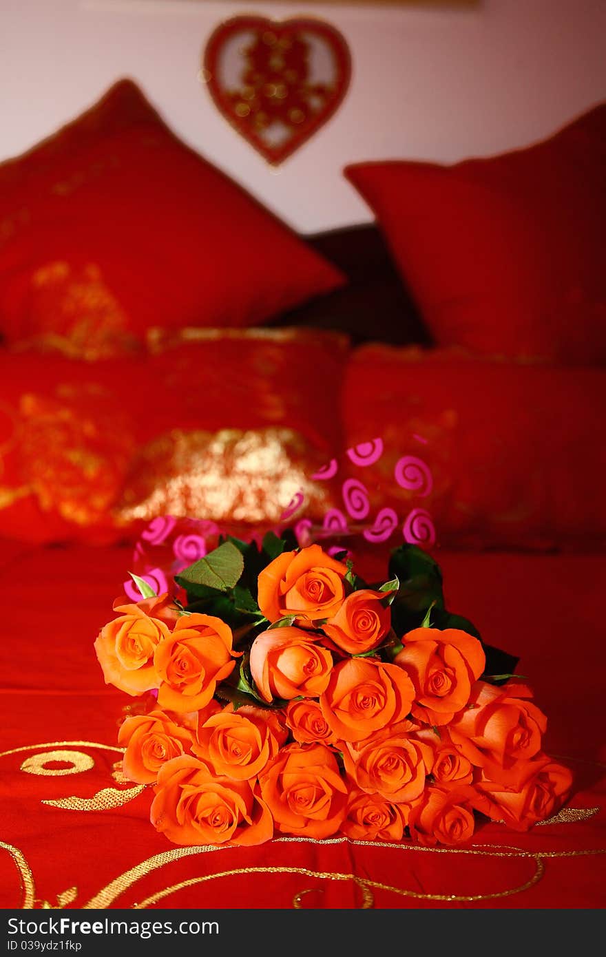 Bridal Bouquet On A Red Bed