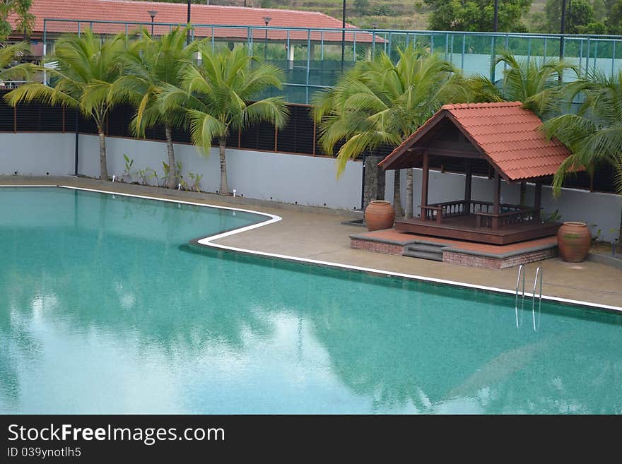 Swimming Pool with coconut tree at Putrajaya