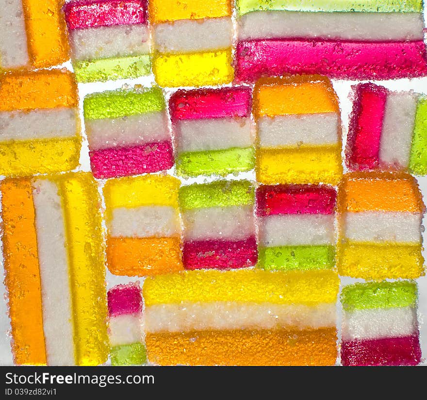 The fruit candy multi-colored all sorts, a background. The fruit candy multi-colored all sorts, a background