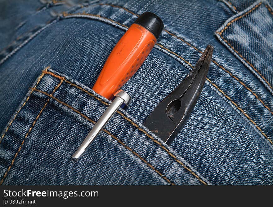 Screwdriver pliers in the pocket. Screwdriver pliers in the pocket