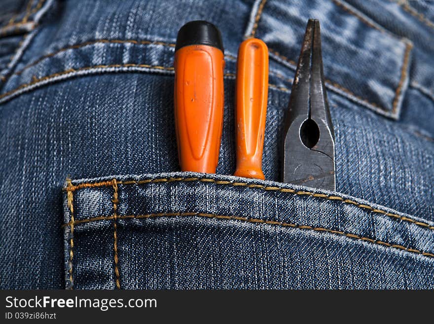 Screwdriver pliers in the pocket. Screwdriver pliers in the pocket