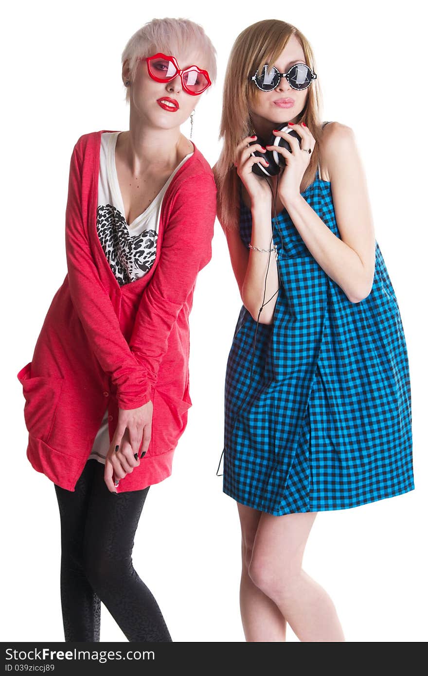 Lovely teenage girls having fun together, white background