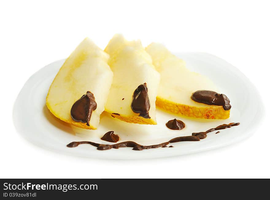 Melon's dessert with chocolate sauce, isolated on white