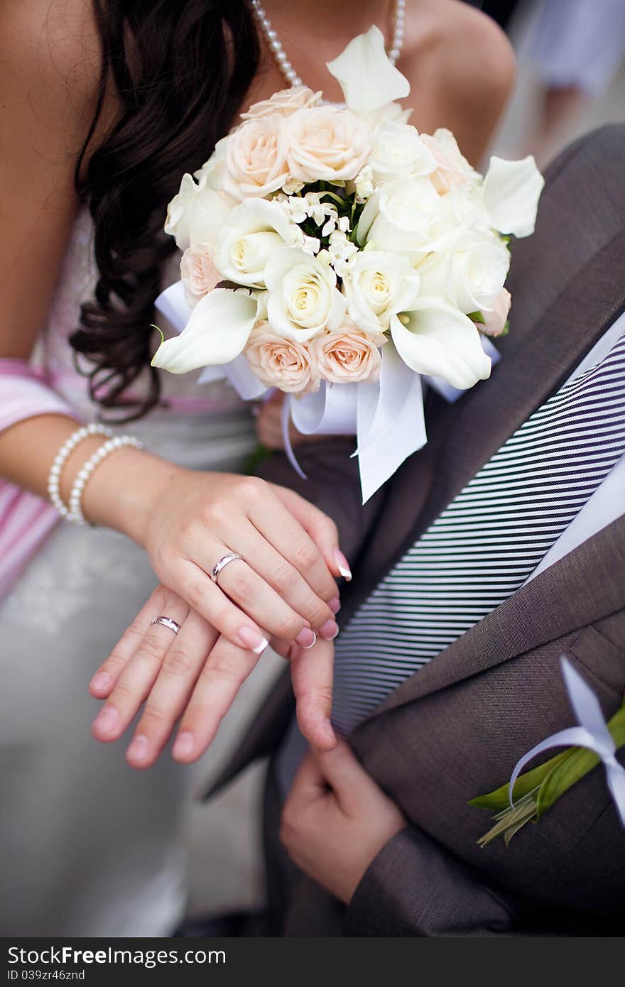 Hands of bride and groom. Hands of bride and groom