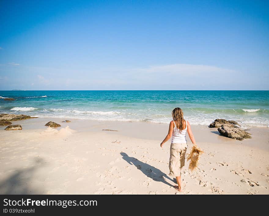 Woman running at the beach. Woman running at the beach