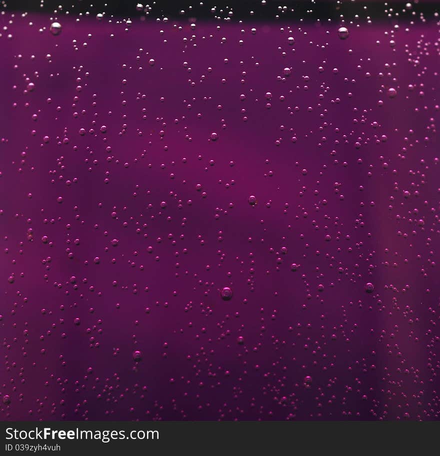 Water Drops On Abstract Red Surface