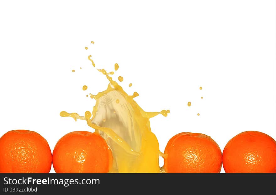 Splashing Orange Juice On White