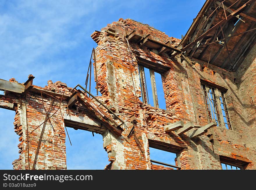 Ruins of an old industrial building against the sky