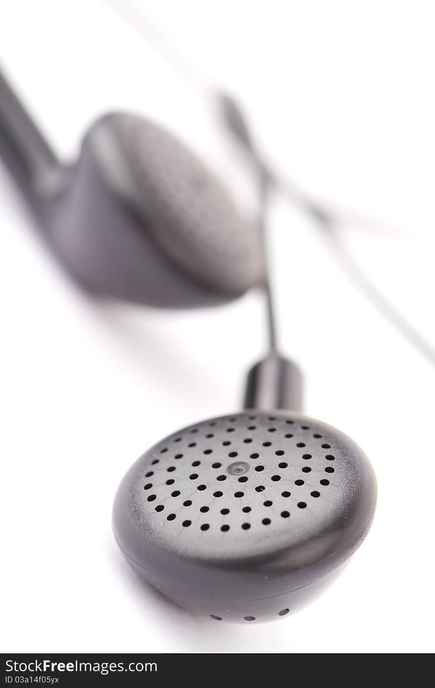 Closeup of earphones isolated on white background.