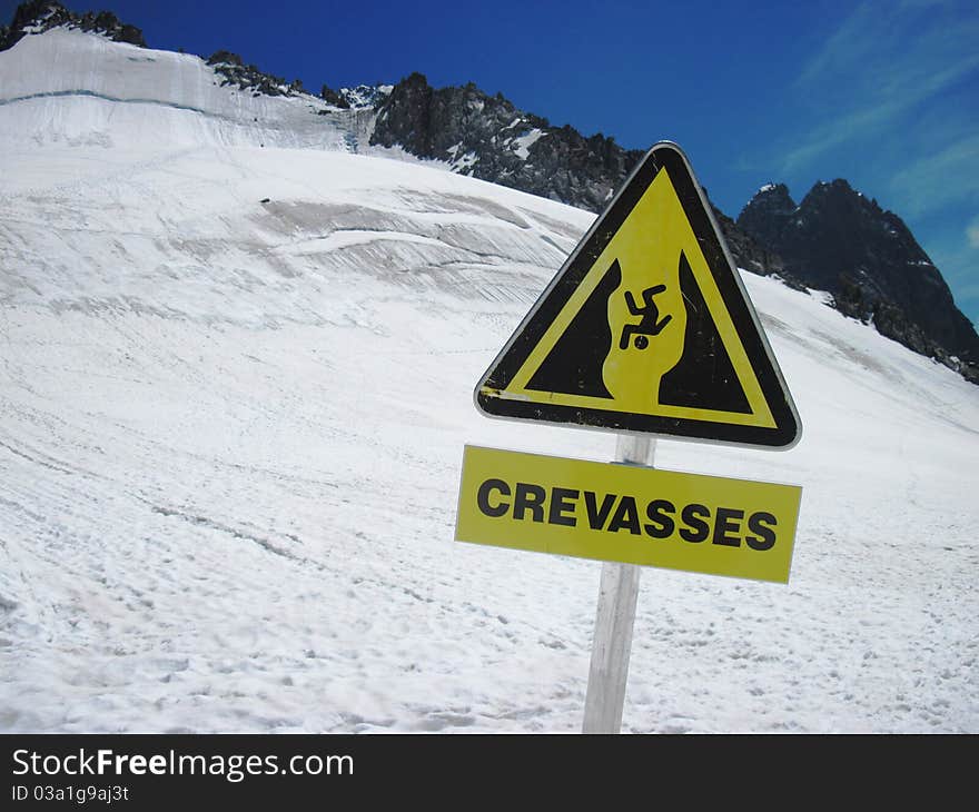 Sign on the Grands Montets glacier to be careful. Sign on the Grands Montets glacier to be careful.