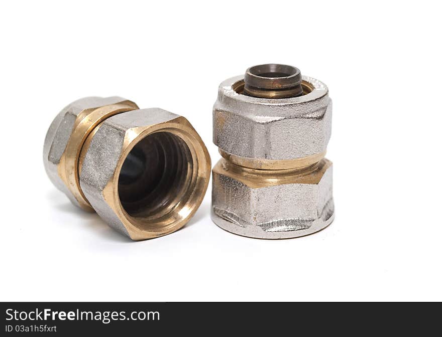 Two steel nuts on white background close-ups.