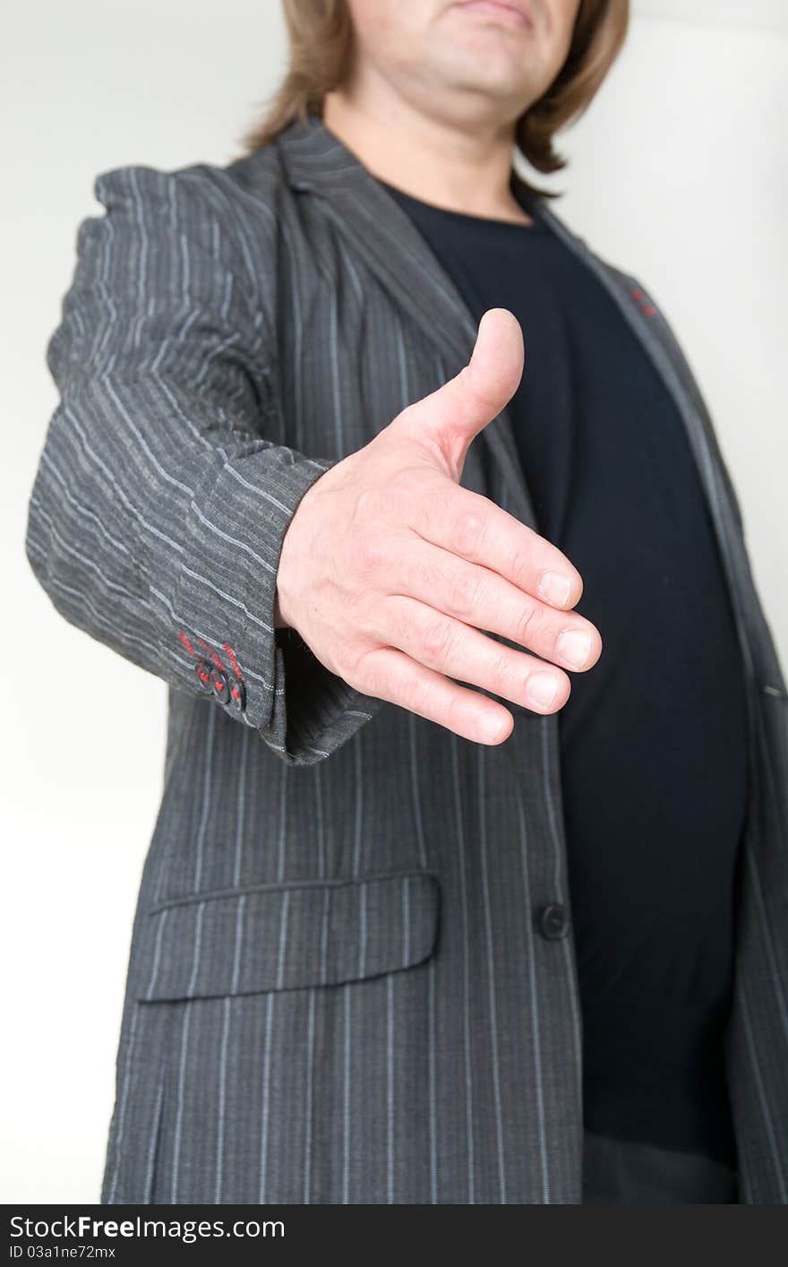 Hand man, a handshake on a white background