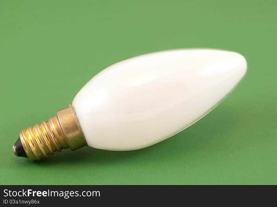 White light bulb macro photography green background