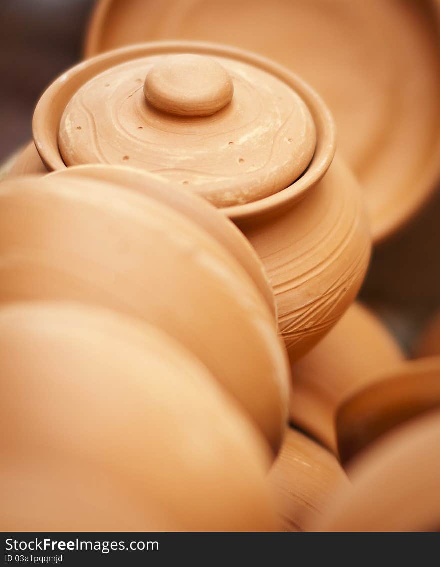 Close-up of handmade earthenware at an exhibition. Close-up of handmade earthenware at an exhibition