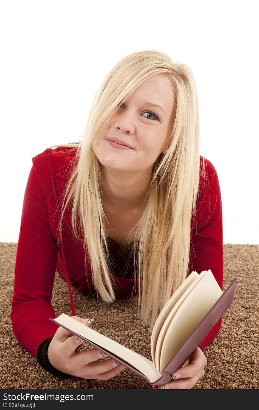 Woman laying facing with book