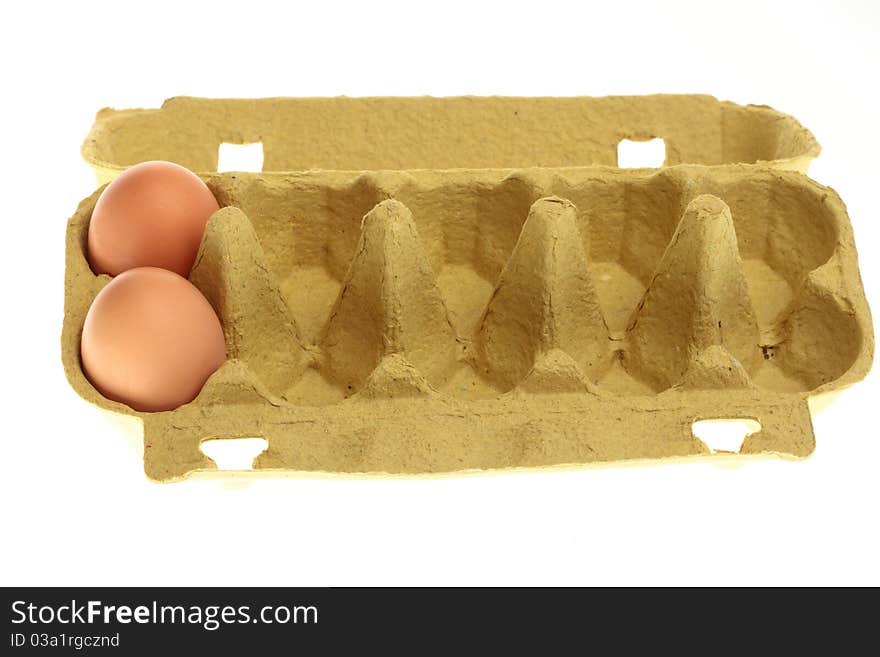 Eggs in box isolated on a white background