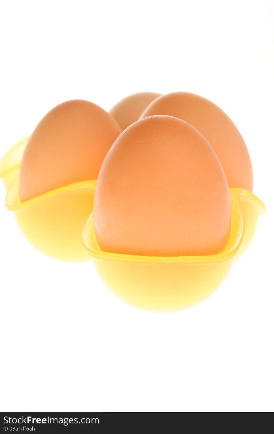 Eggs in box isolated on a white background