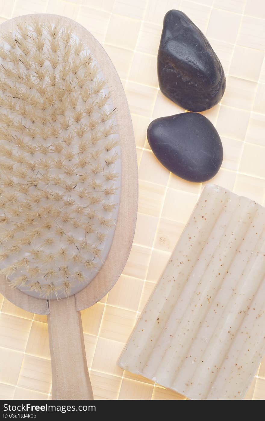 Relaxing Spa Scene with Soap and Massage Scrub Brush.