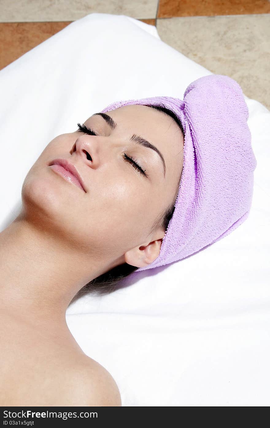 Young woman in spa salon