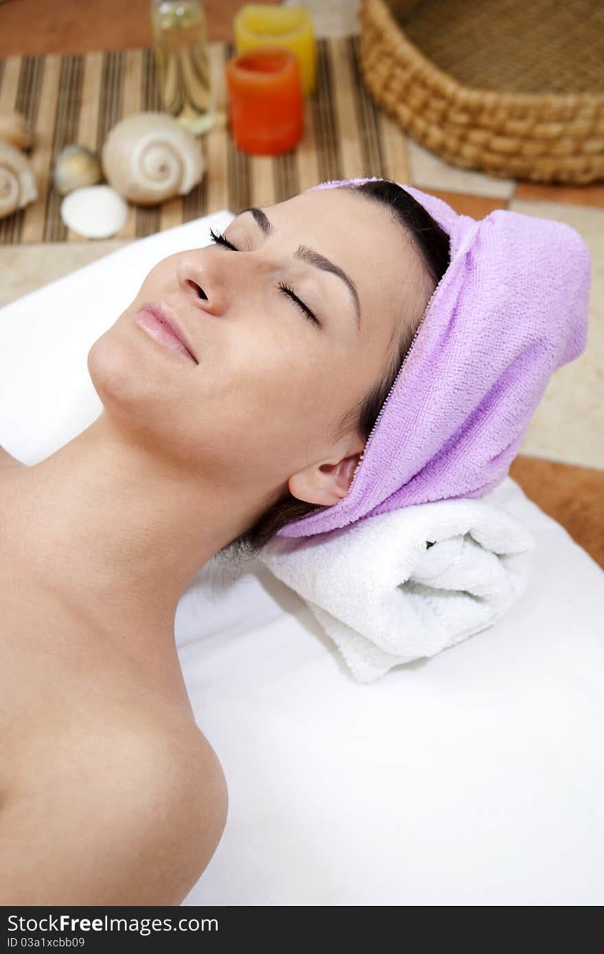 Beautiful Young Woman Enjoying Spa Salon