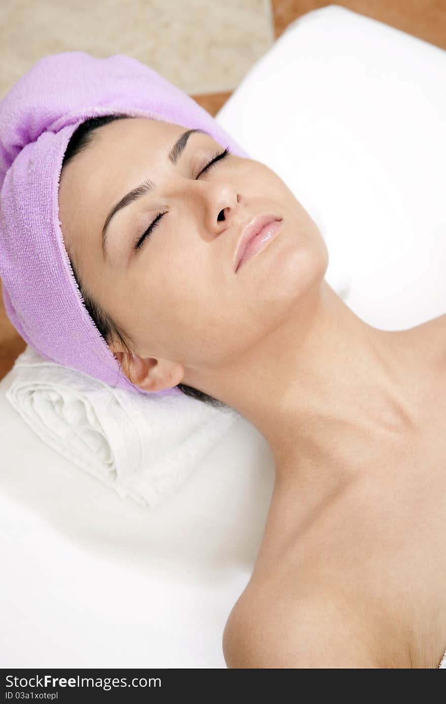 Young woman in spa salon