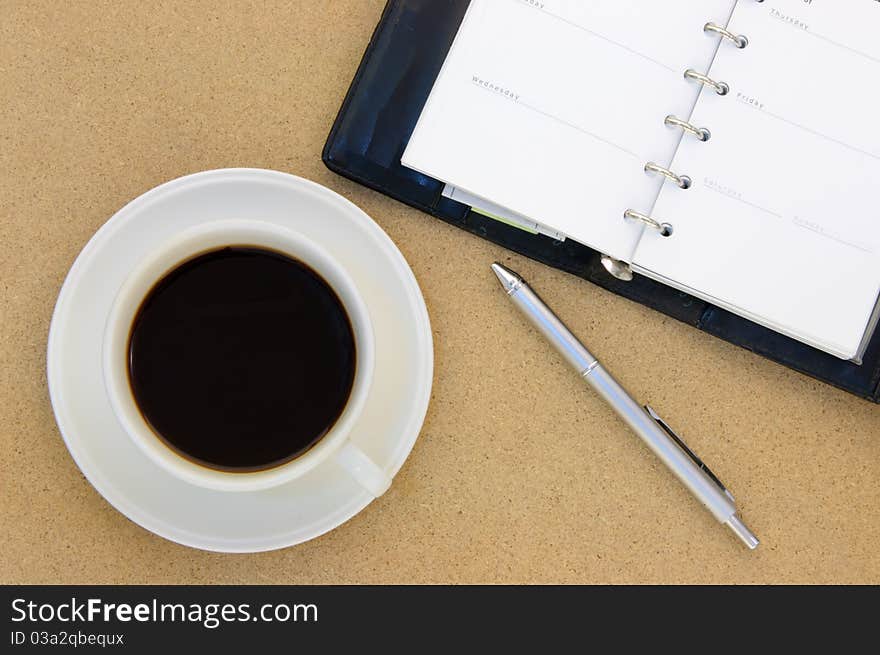 Coffee and book on table