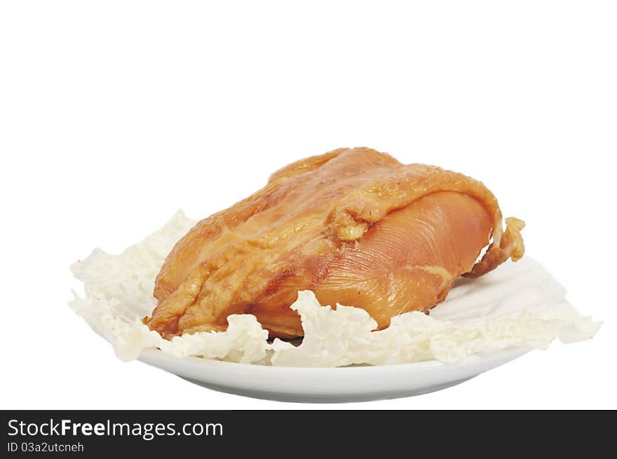 Smoked chicken in a dish on a white background