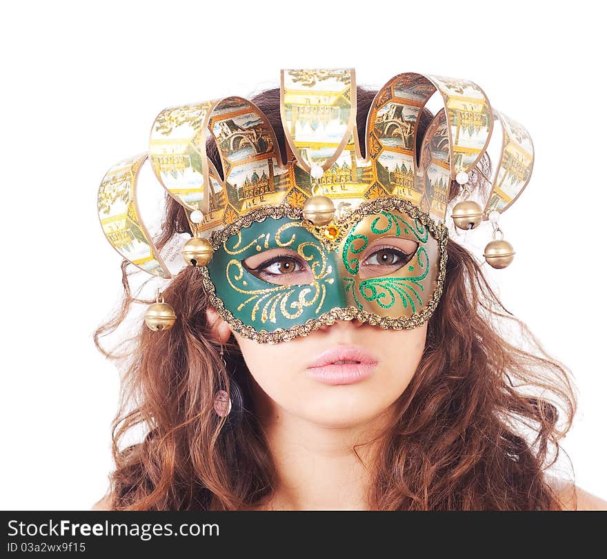 The serious girl in a mask on white background