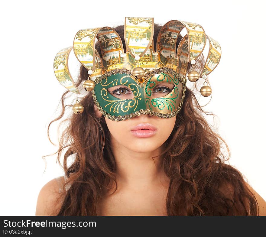 The serious girl in a mask on white background