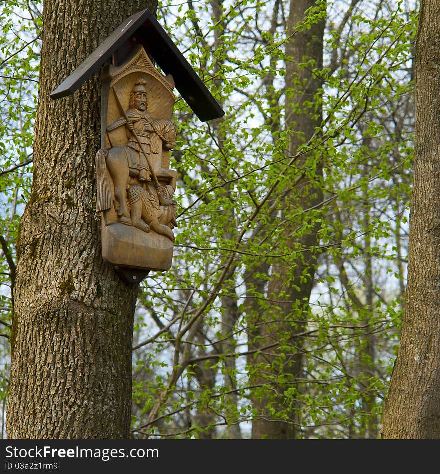 Wooden Sculpture On The Tree