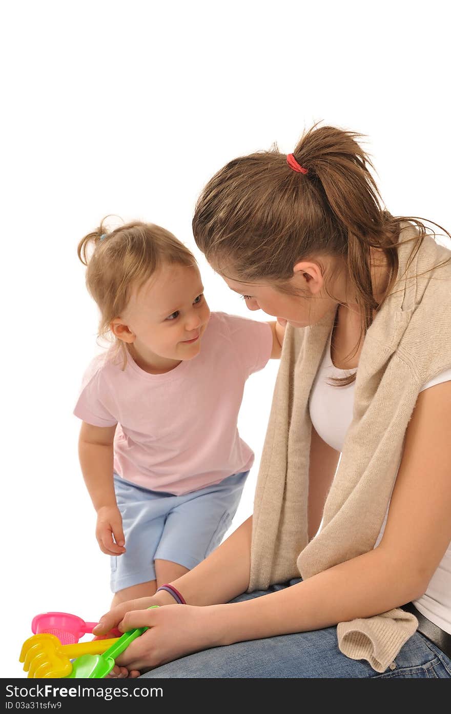 Girl With Little Baby In Studio