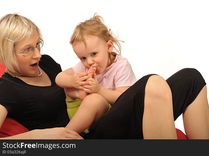 Mother With Little Baby In Studio