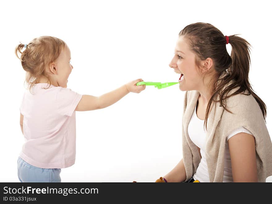 Girl With Little Baby In Studio