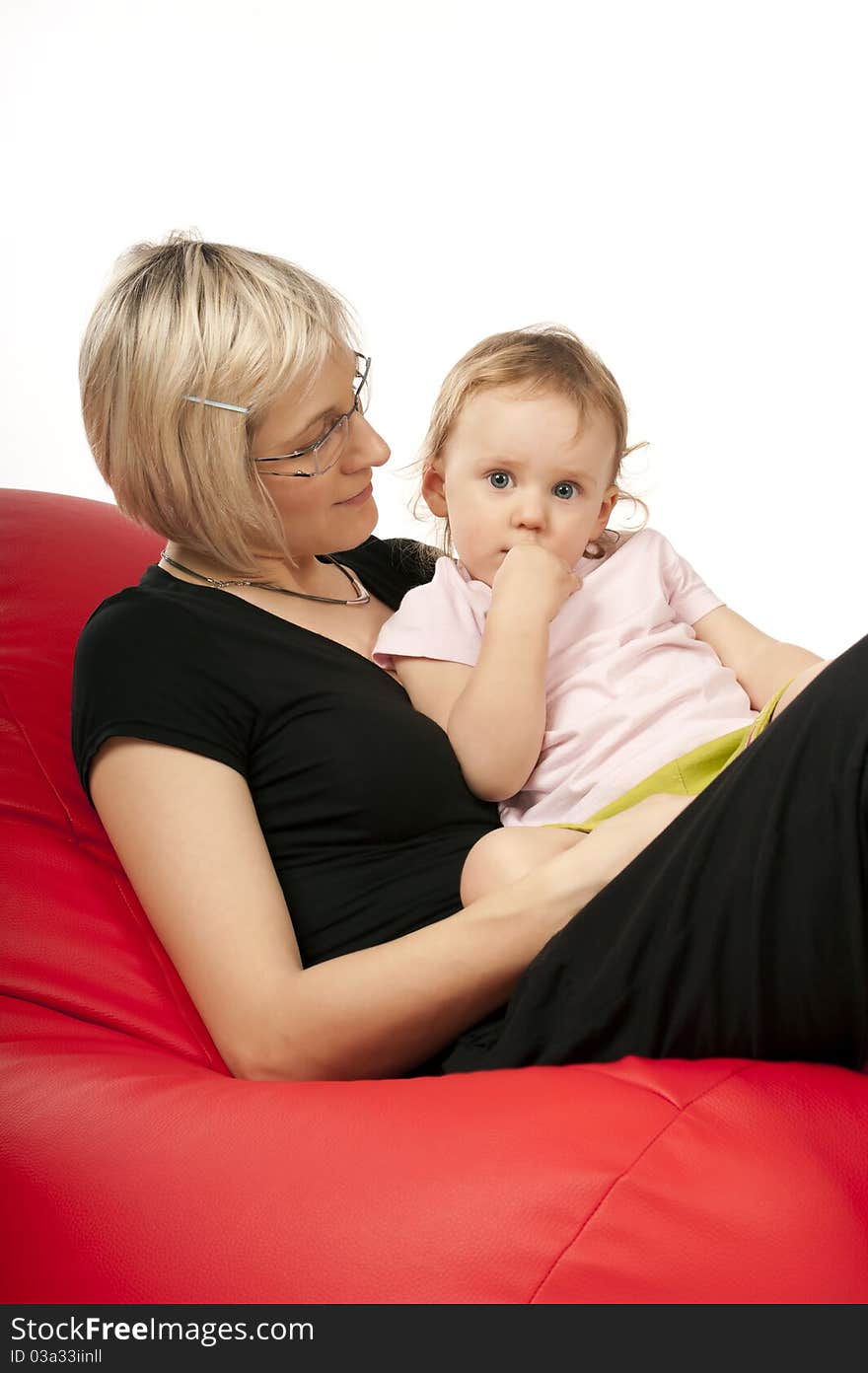 Mother with little baby in studio