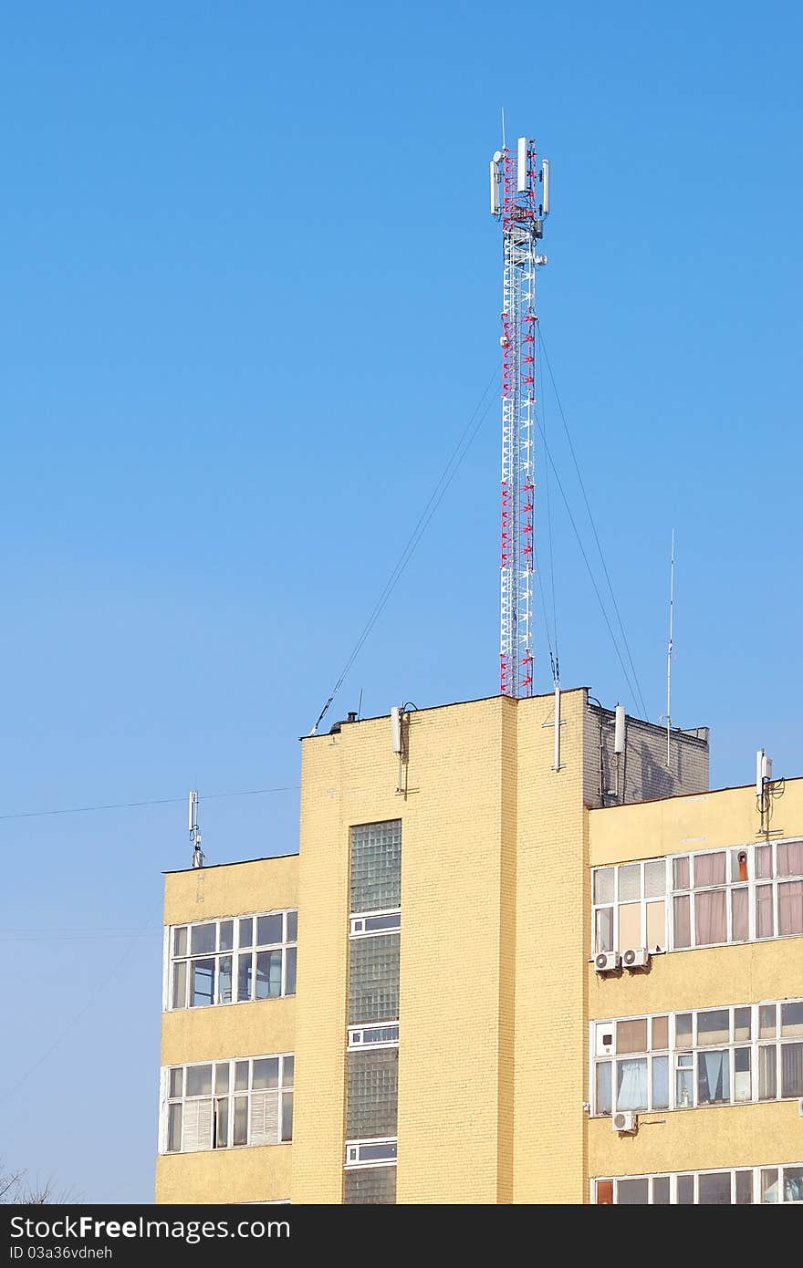 Detail of transmitter tower against clear blue sky