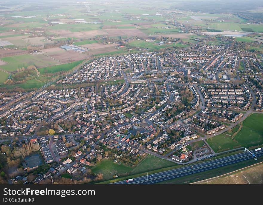 Aerial view of the village of Bavel (Netherlands). Below right you see the windmill of Bavel.