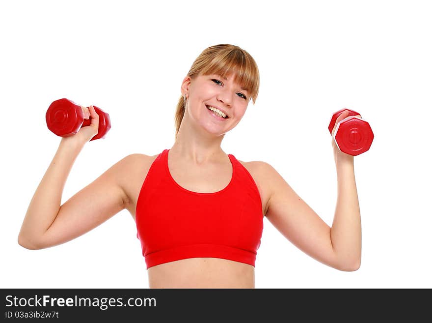 Young girl doing fitness exercises over white background. Young girl doing fitness exercises over white background.