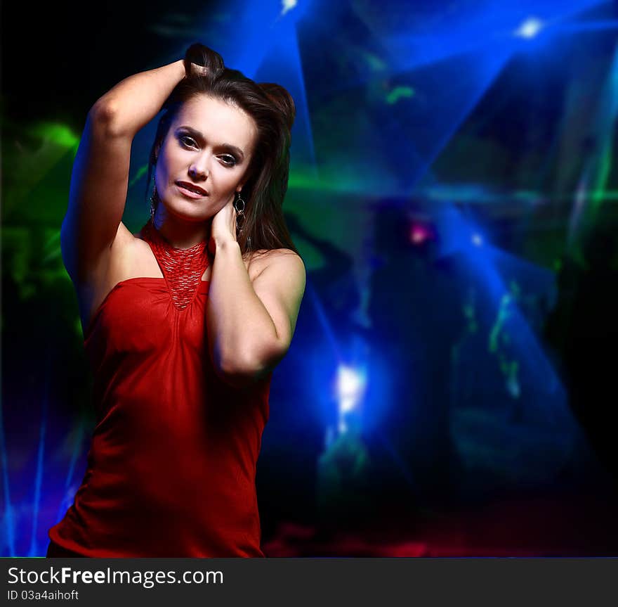 Beautiful young woman dancing