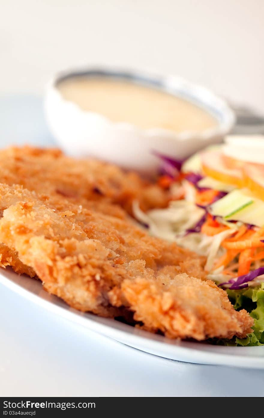 Batter-fried pork salad show as shallow depth of field photograph technical