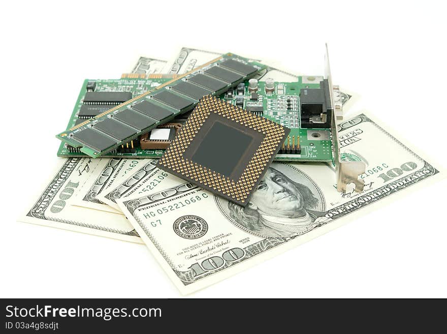 Computer components and money on white background