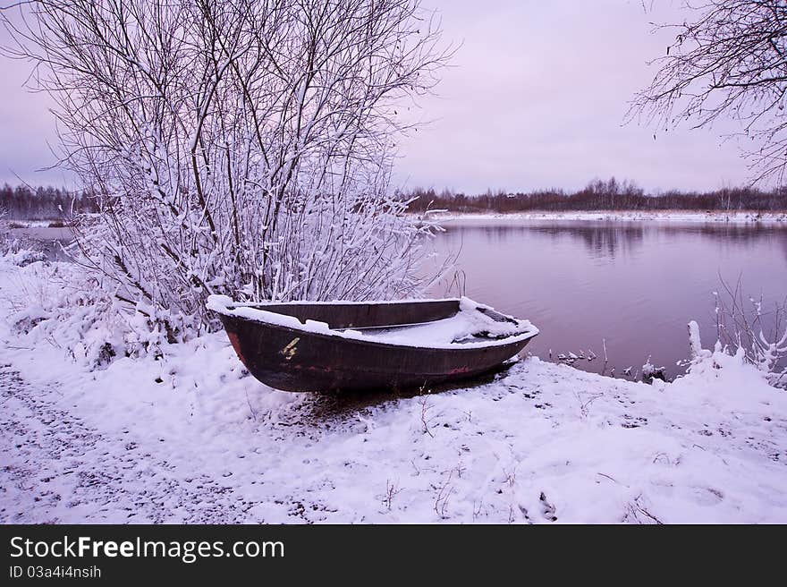 Winter boat.Soon dawn