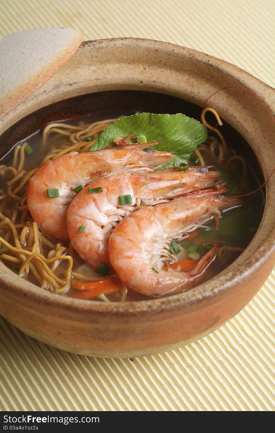 Claypot seafood soup with crispy noodle. Claypot seafood soup with crispy noodle