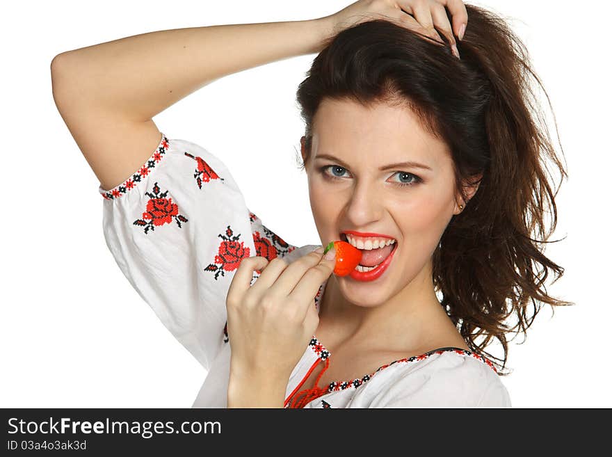 Young female biting a strawberry isolated on white. Young female biting a strawberry isolated on white