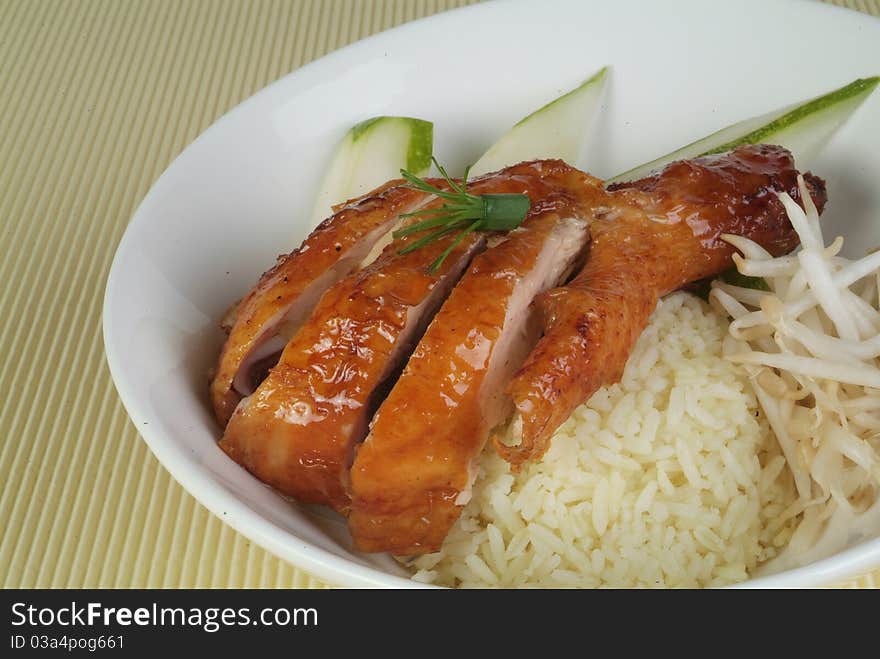 A plate of traditional malaysian chinese chicken rice