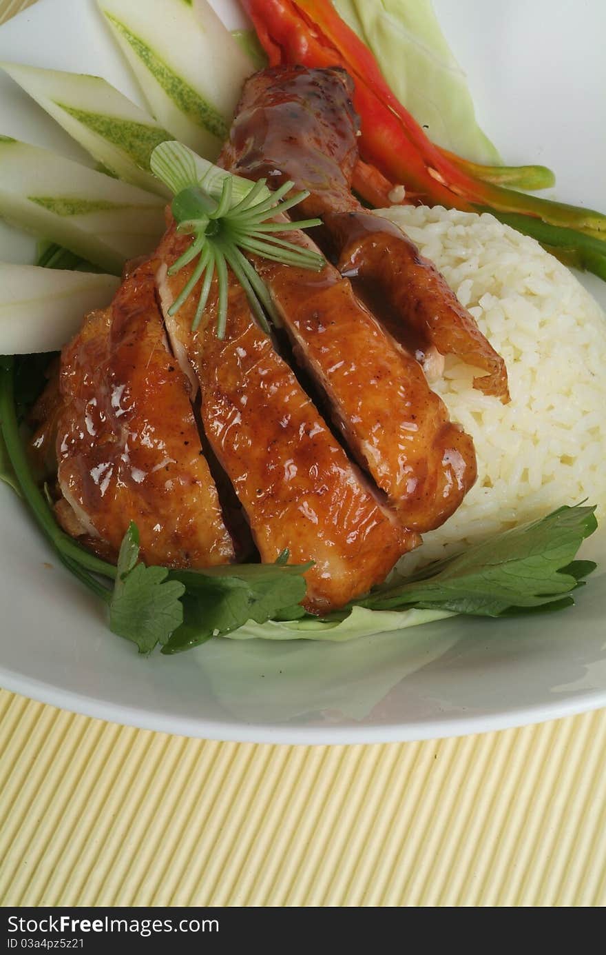 A plate of traditional malaysian chinese chicken rice