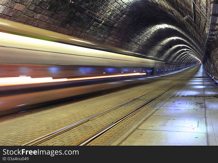 A train disappearing into a tunnel