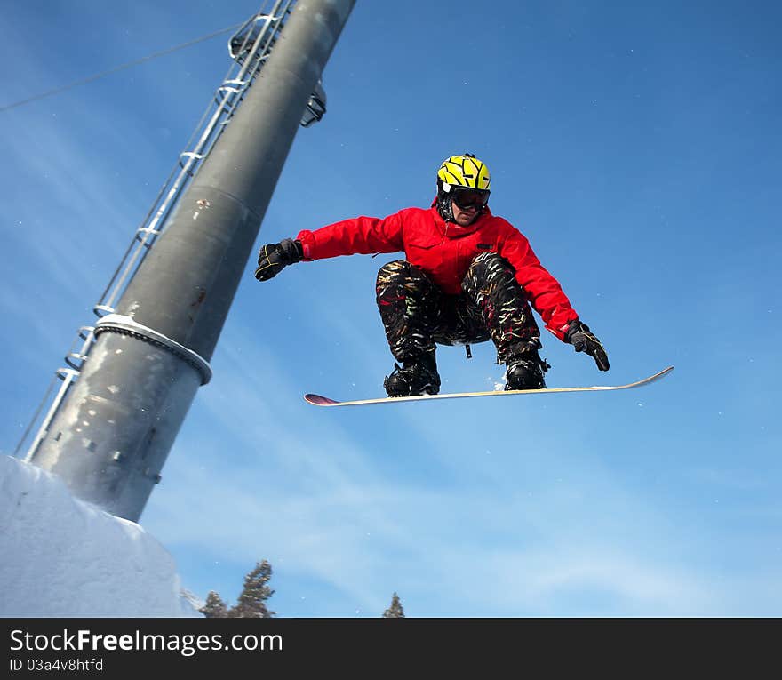 Snowboarder jumping