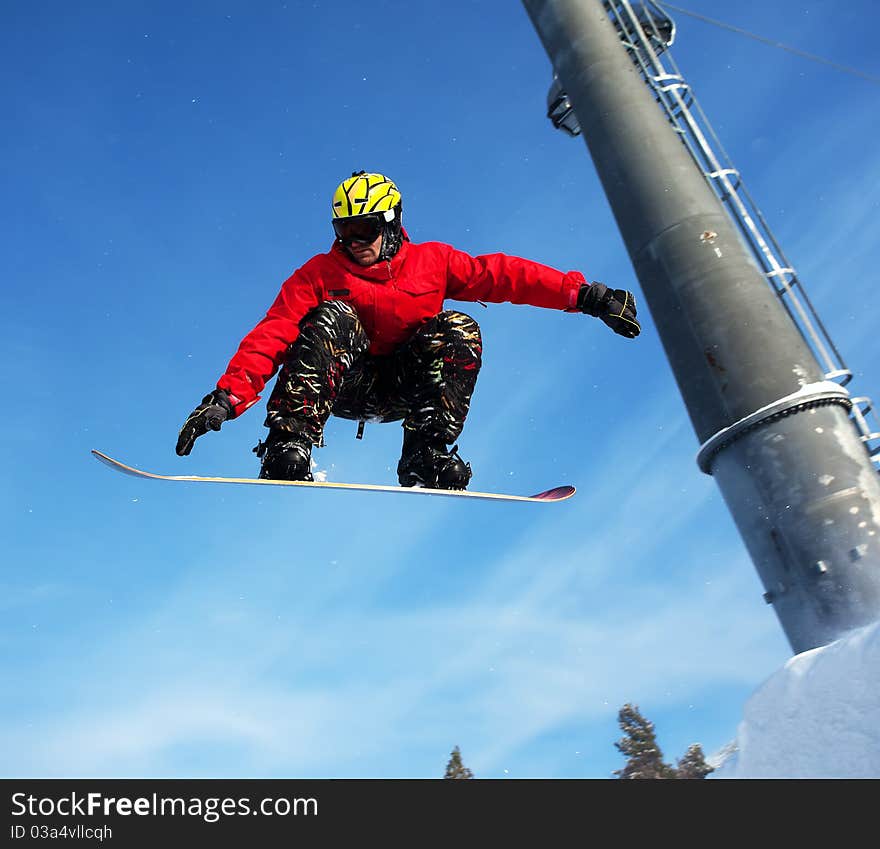 Snowboarder jumping