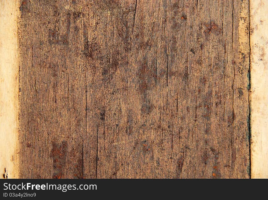 Old grunge scratched wood background. Old grunge scratched wood background